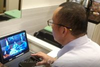 Buka Rapat via Zoom dari Jakarta, Wakil Bupati Boalemo, Lahmuddin Hambali Buka Rapat TPAKD, Targetkan Akses Keuangan Hingga Pelosok Desa. Foto/@ist.