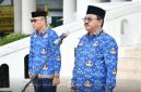 Bupati Boalemo Drs. Rum Pagau di dampingi Wakil Bupati Boalemo Saat Memipin Apel Kopri. Foto/@arif