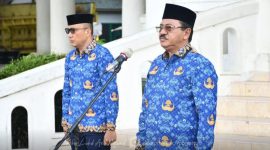 Bupati Boalemo Drs. Rum Pagau di dampingi Wakil Bupati Boalemo Saat Memipin Apel Kopri. Foto/@arif