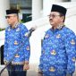 Bupati Boalemo Drs. Rum Pagau di dampingi Wakil Bupati Boalemo Saat Memipin Apel Kopri. Foto/@arif